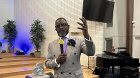 Pastor Calvin Hopkins sends off the centennial with his closing remarks.