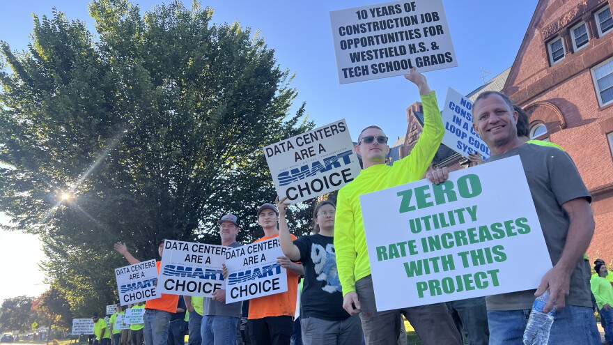 Labor advocates rally in support of a proposed data center project in Massachusetts.