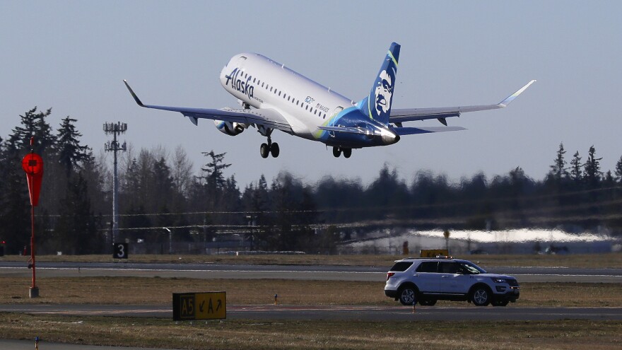 An Alaska Airlines Embraer 175 jet, similar to this one, was forced to make an unexpected landing Sunday night after an off-duty pilot who was riding in the cockpit allegedly attempted to disable the aircraft's engines.
