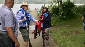 Canalway Coalition Dan Rice takes Akron Councilwoman Veronica Sims out on Summit Lake -- newly declared safe for boating, fishing and birdwatching.