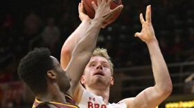 Bradley sophomore forward Rienk Mast takes a shot over a Loyola defender during their game earlier this season at Carver Arena in Peoria.