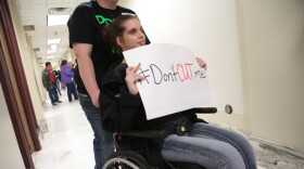 Jordan Martin and other developmentally disabled people, along with advocates and caregivers, urged lawmakers to prevent budget cuts at the state Capitol in Oklahoma City Thursday.