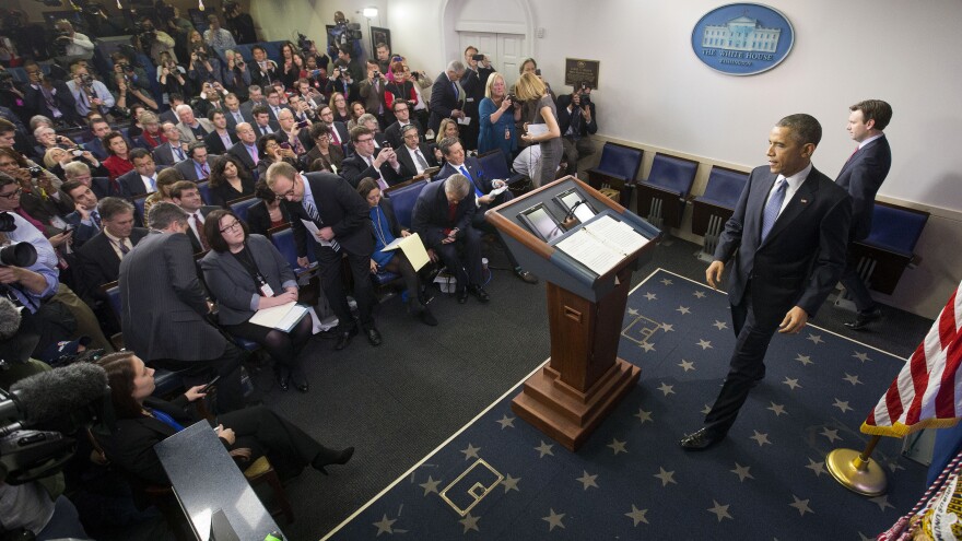 President Obama arrives for a news conference Dec. 19 in the Brady Press Briefing Room of the White House in Washington.