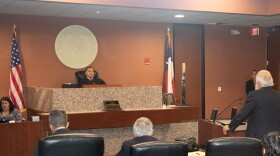Defense attorney Joe Spencer, standing, addresses 409th District Judge Sam Medrano Jr. during a hearing on Oct. 11, 2022.
