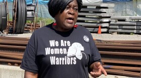Betty Jean Grant wearing a  black "We Are Women Warriors" t-shirt.