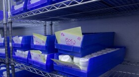 Bottles of milk sit in the Oklahoma Mothers Milk Bank Freezer.