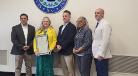 Albany County Health Commissioner Dr. Elizabeth Whalen, Albany County Legislature Chair Andrew Joyce, Deputy Legislature Chair Wanda Willingham, and local officials at a sendoff ceremony for Whalen at the County Office Building on October 23, 2023.