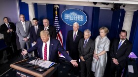 President Trump, center left, speaks during a Coronavirus Task Force news conference in the briefing room of the White House on Friday, March 20, 2020.