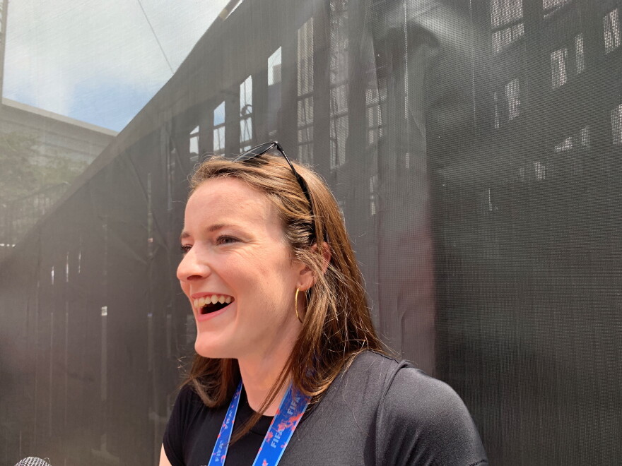 Rose Lavelle laughs as she talks to members of the press about her favorite Skyline order.