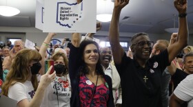 People celebrate the defeat of Issue 1 during a watch party Tuesday, Aug. 8, 2023, in Columbus, Ohio. Ohio voters have resoundingly rejected a Republican-backed measure that would have made it more difficult to pass abortion protections. (AP Photo/Jay LaPrete)