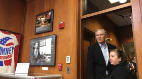 Gov. Jay Inslee enters a conference room at the New Hampshire Institute of Politics at Saint Anselm College where he spoke to students last month.