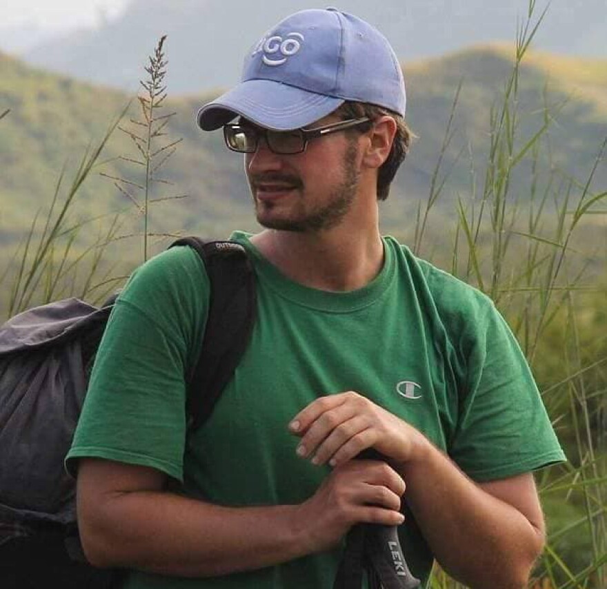 Michael Sharp on hike along Lake Kiva. (Courtesy of the Sharp family)