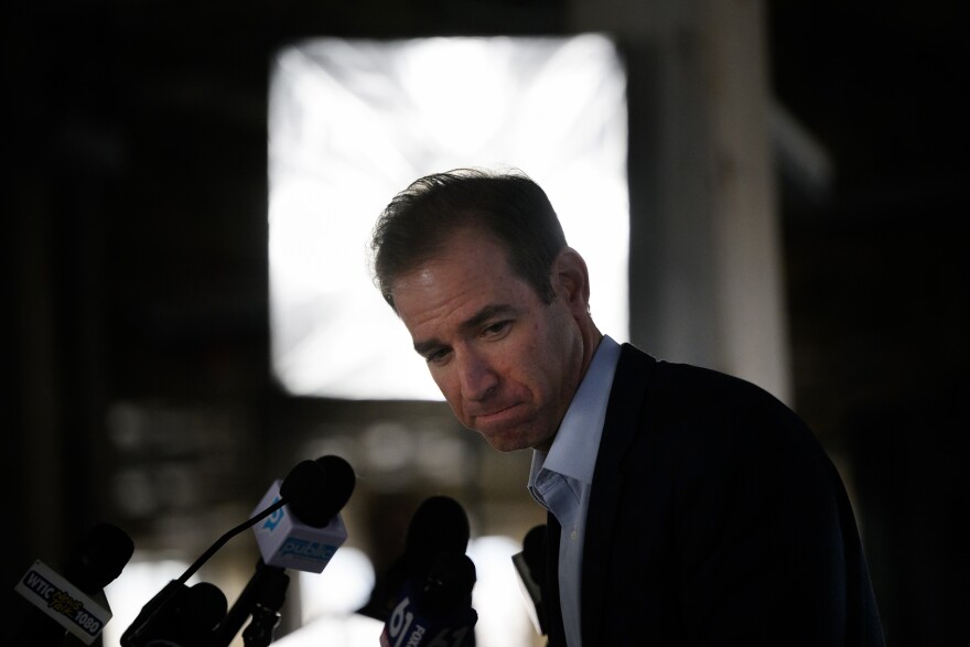 Hartford Mayor Luke Bronin speaks during a press conference at the former Fuller Brush Factory during a press conference to announce a $36-million project to develop the building into a 160-unit apartment complex, December 06, 2023.