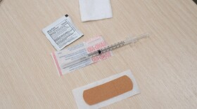 A shot and a bandaid