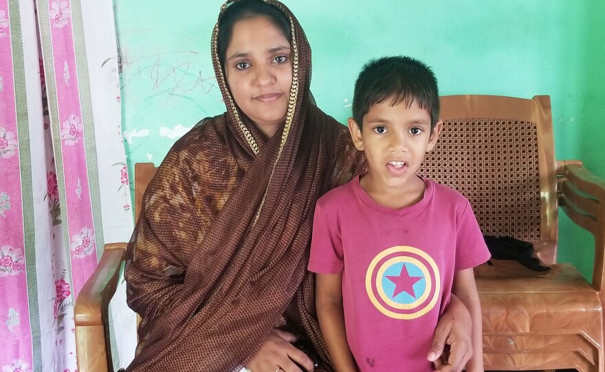 Fatima Jannath and her son Yusef sit in their home in Mawanella, Sri Lanka. Jannath's husband Mohammad Taslim was shot in the head after he tried to warn authorities about radicalization in their Muslim community. Suicide bombers killed more than 250 people on Easter this year.