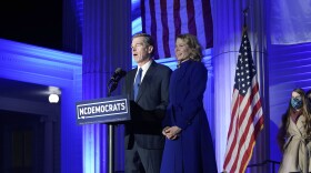 North Carolina Gov. Roy Cooper, joined by his wife Kristin, speaks after being declared winner over Republican Dan Forest in the governor's race in Raleigh, N.C., Tuesday, Nov. 3, 2020.