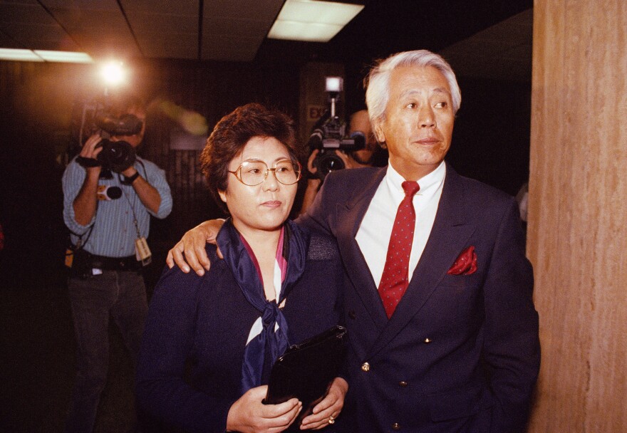 Soon Ja Du, 51, left, leaves court with her husband, Billy Hong Ki Du, in Los Angeles on Nov. 24, 1992. The Korean grocer's killing of 15-year-old Latasha Harlins raised tensions in the Black community just two weeks after Rodney King's beating.