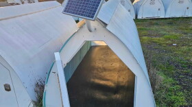 Rows of rigid tent structures 
