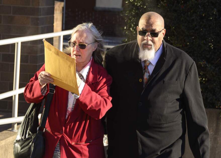 Cedric Lodge, former morgue manager at Harvard Medical School, and his wife Denise enter the Herman T. Schneebeli Federal Building and Courthouse for a sentencing hearing in Williamsport, Pa. on Tuesday, Dec. 16, 2025. The two had each pleaded guilty to one count of interstate transport of stolen goods after selling human remains taken from the school morgue over a four year period.