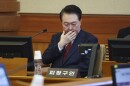 FILE — Impeached South Korean President Yoon Suk Yeol sits at his impeachment trial at the Constitutional Court in Seoul, South Korea, Tuesday, Jan. 21, 2025.