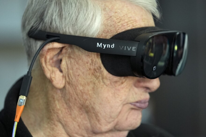  Retired Army Col. Farrell Patrick, 91, wears a Mynd Immersive virtual reality headset at John Knox Village, Wednesday, Jan. 31, 2024, in Pompano Beach, Fla. John Knox Village was one of 17 senior communities around the country that participated in a recently published Stanford University study that found that large majorities of 245 participants between 65- and 103-years-old enjoyed virtual reality, improving both their emotions and their interactions with staff.