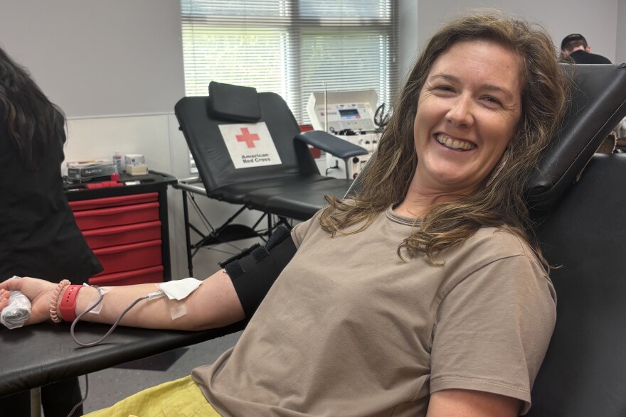 Meghan Moynihan donates blood during a recent trip to the American Red Cross office in Winchester.