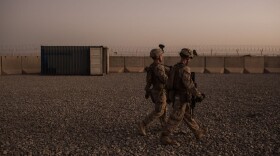 U.S. Marines walk to guard stations at Camp Shorab on Sept. 11, 2017 in Helmand Province, Afghanistan. (Andrew Renneisen/Getty Images)