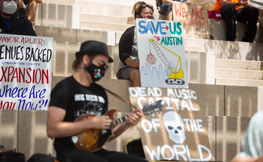 Demonstrators rally outside Austin City Hall on Sept. 16 in support of a resolution that would provide funding sources for relief programs for the music and arts industries. 