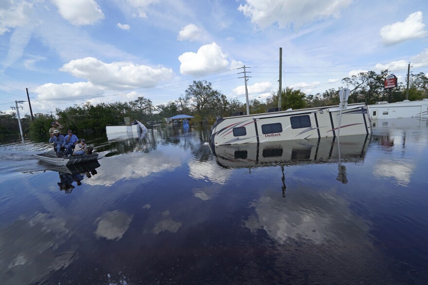 Flooded campers are seen at the Peace River Campground in the aftermath of Hurricane Ian in Arcadia, Fla., Monday, Oct. 3, 2022. (AP Photo/Gerald Herbert)