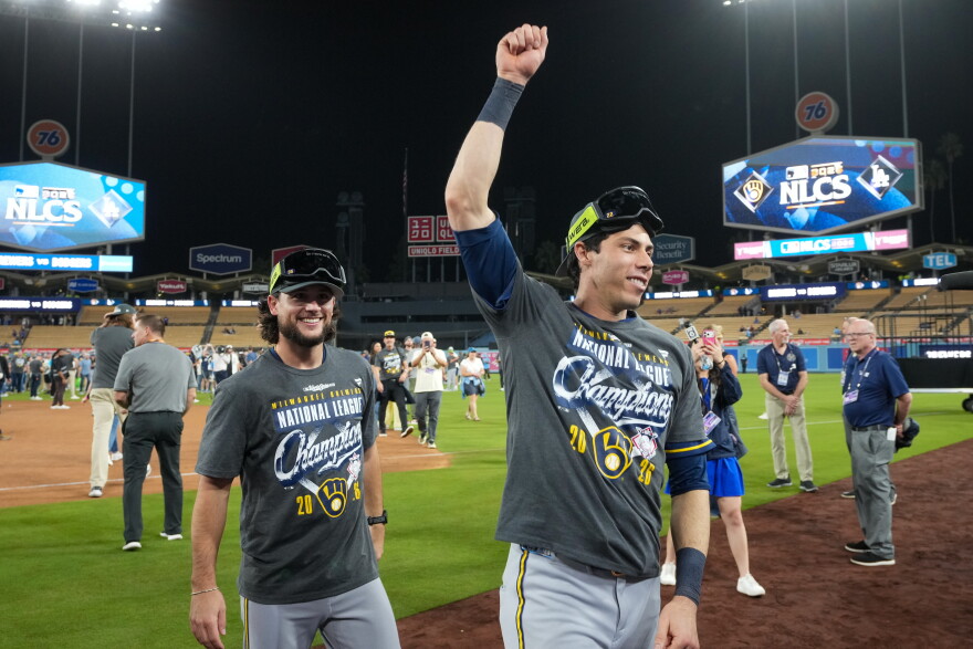 Milwaukee Brewers designated hitter Christian Yelich celebrates after Game 4 of baseball's National League Championship Series between the Milwaukee Brewers and the Los Angeles Dodgers, Thursday, Oct. 15, 2026, in Los Angeles. (AP Photo/Gregory Bull)