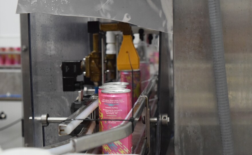 The final cans of sangria come off of the canning line ready to be packaged and sent out to distributors.