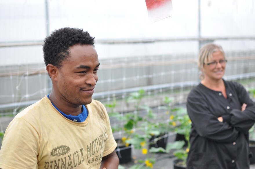 Diwt Gerewakl and Debbie Bacho in a P&M Gardens greenhouse.