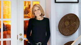 FILE - Gloria Steinem poses for a picture at her home in New York on Oct. 19, 2015.