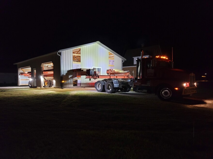 Late evening on November 9, David DeVooght's crew move a pole barn a few miles north of the Vantage data center site.