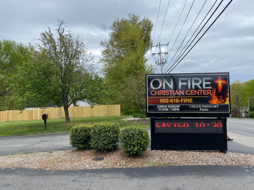 Cars in the parking lot of On Fire Christian Church