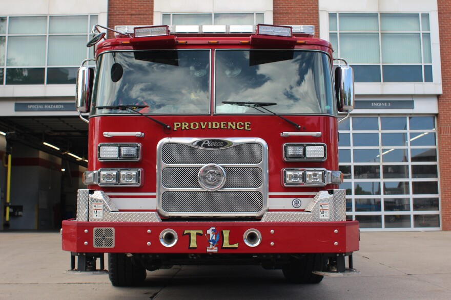 A Providence ladder truck sits outside the city’s Public Safety Complex. Providence is suing several major firetruck manufacturers, alleging they drove up prices through industry consolidation and price collusion.