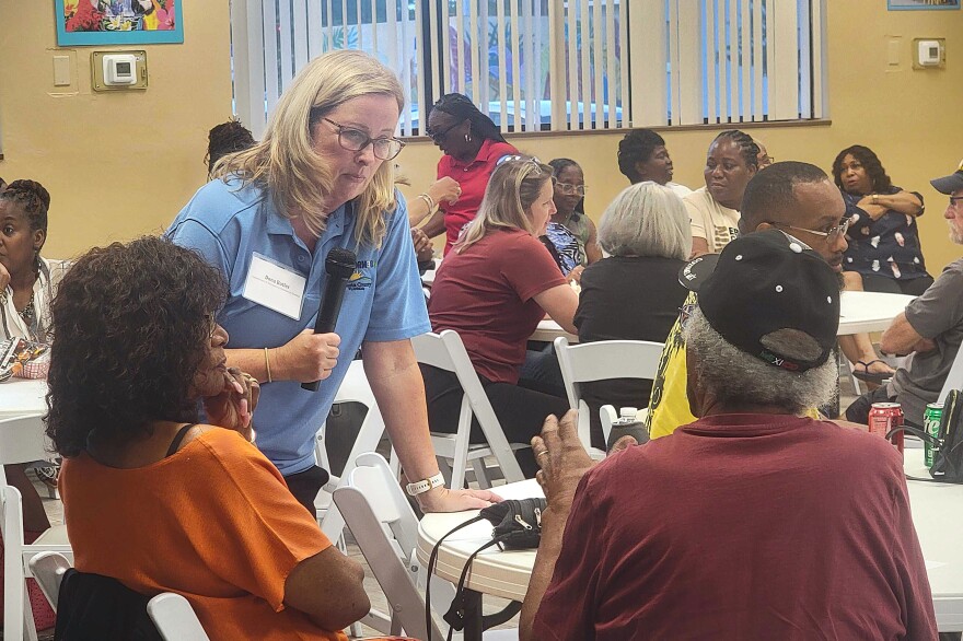 Transform386 Director Dona Butler addresses attendees' questions and concerns at an informational event Thursday, July 24, 2025, at the John H. Dickerson Community Center in the Midtown area of Daytona Beach in Volusia County.