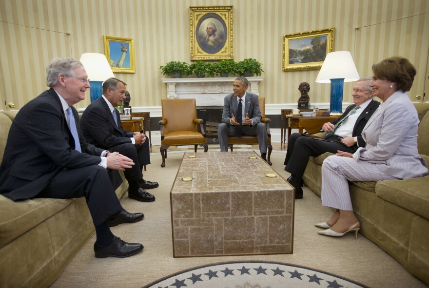 Before talking about the situation in Iraq, President Obama bantered with (from left to right) Senate Minority Leader Mitch McConnell, House Speaker John Boehner, Senate Majority Leader Harry Reid and House Minority Leader Nancy Pelosi.