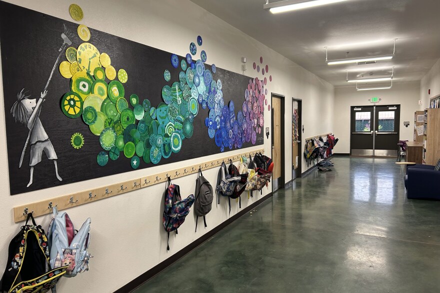 Student art and backpacks line the main corridor at Plumas Charter School, a tiny K-12 campus in Quincy, California, with about 350 students.