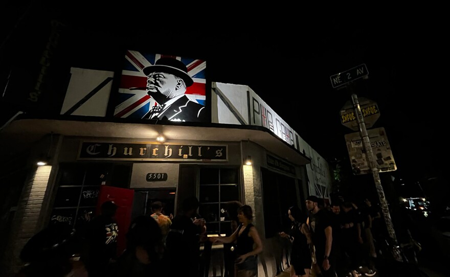 Hundreds of people line the block around Churchill's Pub on Northeast Second Ave in Little Haiti on Friday, Sept. 5, 2025.