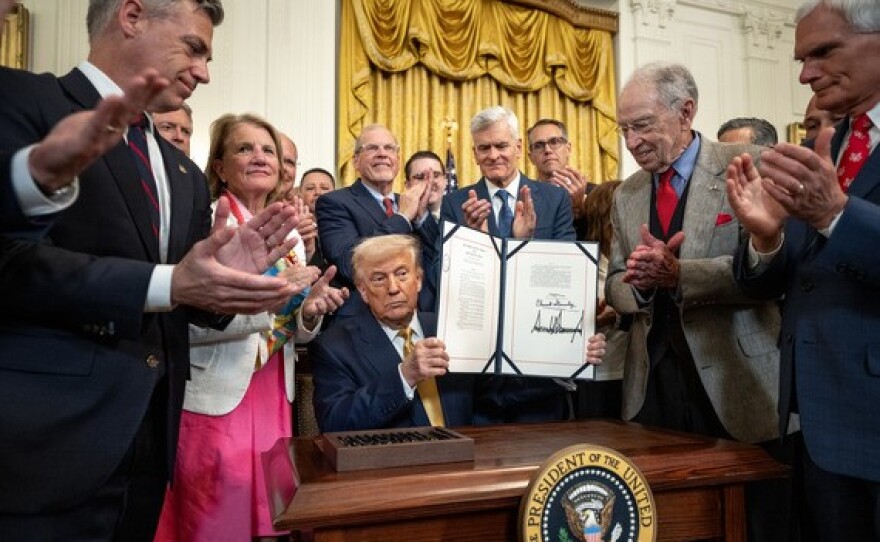U.S. Sen. Chuck Grassley of Iowa stands at President Trump's right, applauding the HALT Fentanyl Act signing at the White House July 16, 2025.