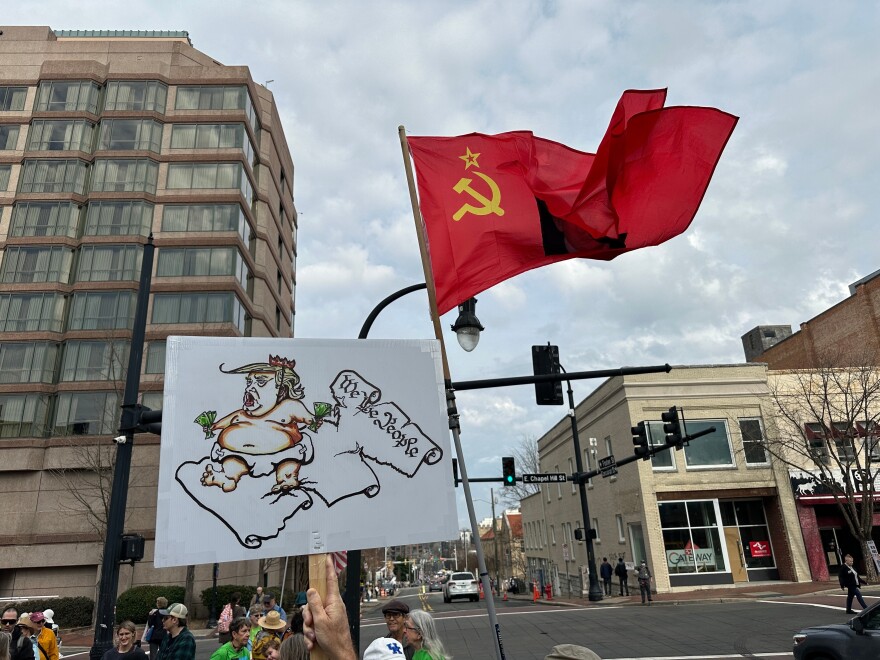 People gather during a protest on Saturday, Jan. 10, 2026 in downtown Durham, NC.