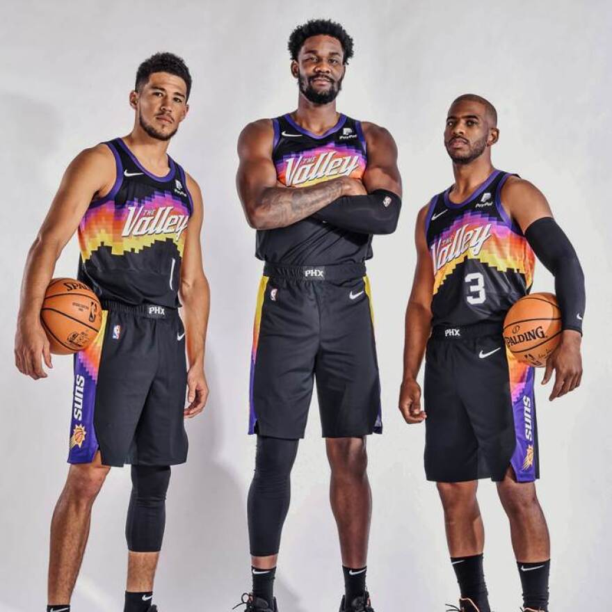 Devin Booker, DeAndre Ayton and Chris Paul