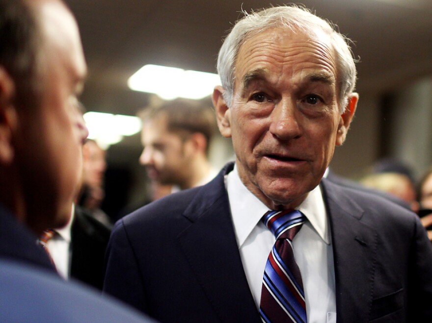 Republican presidential candidate Rep. Ron Paul speaks with voters after a town hall meeting in Keene, N.H., on Nov. 21. 