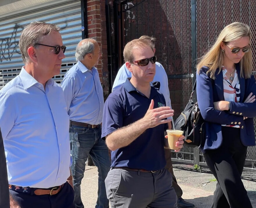 Gov. Ned Lamont and Hartford Mayor Luke Bronin on a walking tour of a redevelopment site north of downtown, near the minor-league baseball park.