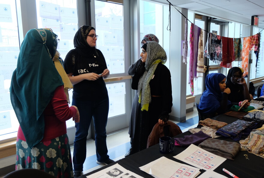 Eman Muthana (gray patterned hijab) organized World Hijab Day to educate her peers about being a Muslim woman