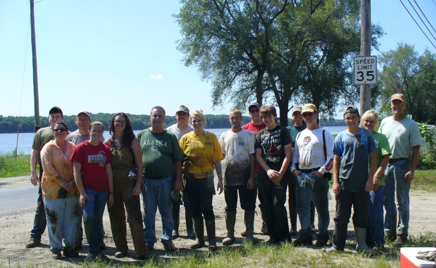 Volunteers at Carp Lake in Davenport pose outdoors during the 2011 XStream Cleanup