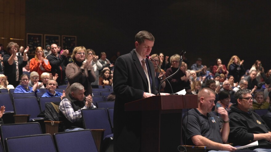 Lackawanna County Commissioner Bill Gaughan receives a standing ovation after speaking out against data centers in Archbald.