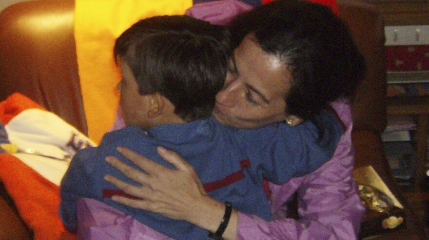 Clara Rojas embraces her son, Emmanuel, at a foster center in Bogota on Jan. 13, 2008. He had been taken from his mother by the guerrillas holding her, and they were apart for three years until her release.