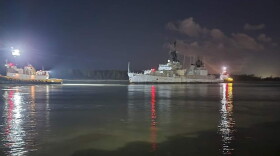 The USS Orleck is towed into Port Arthur, Texas.